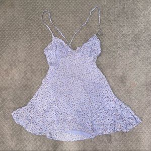 Beginning Boutique blue floral backless romper